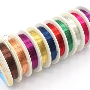A pack of 10 x 10 meter reels of colour coated copper wire. 0.4mm diameter
