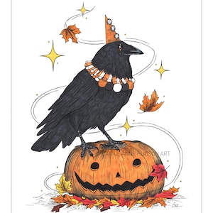 May include: A black crow wearing a party hat and a candy necklace stands on top of a carved jack-o'-lantern pumpkin. The pumpkin is surrounded by orange and red autumn leaves. There are stars and swirls in the background.