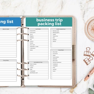 May include: A packing list for a business trip with sections for beach gear, clothing, work essentials, toiletries, and documentation. The list is printed on a white sheet of paper in a binder.