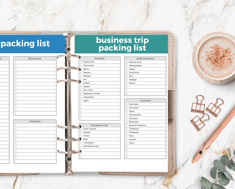 May include: A packing list for a business trip with sections for beach gear, clothing, work essentials, toiletries, and documentation. The list is printed on a white sheet of paper in a binder.