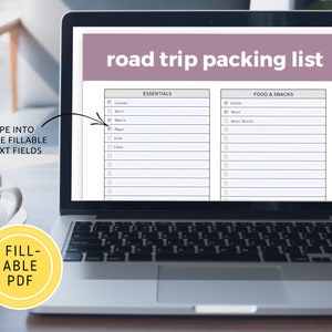 May include: A laptop computer screen displaying a printable road trip packing list with checkboxes. The list is divided into two sections: Essentials and Food & Snacks. The text "TYPE INTO THE FILLABLE TEXT FIELDS" is visible on the left side of the screen. A yellow circle with the text "FILL-ABLE PDF" is visible below the laptop.