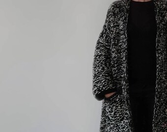 An oversized coat for the winter in handmade pure wool