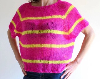 A pure alpaca sweater in bright colors perfect for mid-seasons and cooler evenings, comfortable and very light