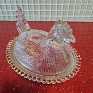 small vintage glass chicken egg holder holds 2/3 eggs
