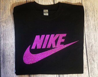 purple and pink nike shirt