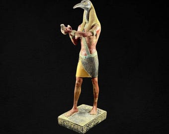 Estatua del dios egipcio Thoth: deidad de la sabiduría, antiguo Egipto
