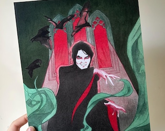 May include: A print featuring a vampire character with pale skin, red accents, and a black cloak. Bats fly in the background against a red and green gothic-style backdrop. Green swirls frame the character.
