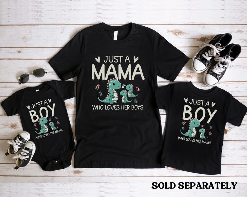 May include: Three black t-shirts with a dinosaur graphic and text that reads "Just a Mama who loves her boys" and "Just a Boy who loves his Mama".