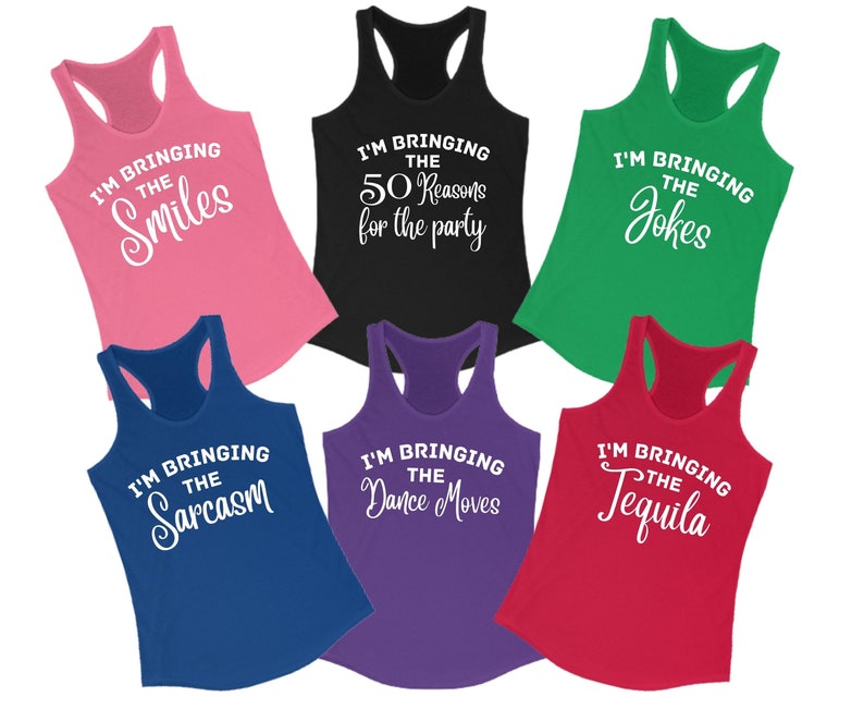 May include: Six tank tops in different colours with white text that reads "I'm bringing the ..." with each tank top featuring a different word: Smiles, 50 Reasons for the party, Jokes, Sarcasm, Dance Moves, Tequila.