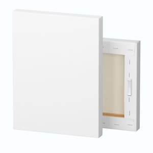 Puede incluir: Dos lienzos blancos en blanco, uno apoyado contra el otro. El lienzo est&aacute; estirado sobre un marco de madera. La parte posterior del lienzo es visible, mostrando el marco de madera y las grapas.