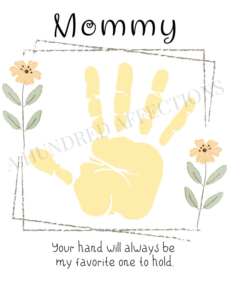 May include: A yellow handprint inside a brown frame with the text "Mommy" at the top and the text "Your hand will always be my favorite one to hold." at the bottom. The image has a floral design with yellow flowers and green leaves on each side of the frame.