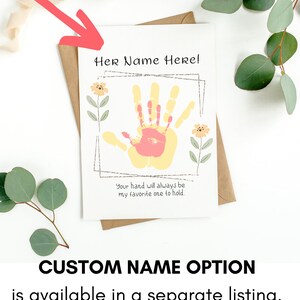 May include: A white card with a handprint in yellow and pink with flowers and the text "Her Name Here!" and "Your hand will always be my favorite one to hold."