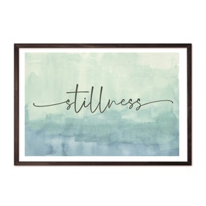 May include: A watercolor painting with a gradient of light green to blue. The word "stillness" is written in cursive in the center of the painting.