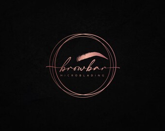 May include: A logo for a business called "browbar" that specializes in microblading. The logo is a circle with a double outline in a rose gold color. Inside the circle is a stylized eyebrow and the text "browbar" in a script font. Below the circle is the text "MICROBLADING" in a sans-serif font.