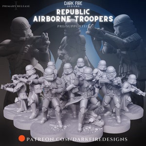 May include: A set of 10 grey plastic miniature figures of Republic Airborne Troopers, posed in various action stances, holding weapons. The figures are pre-supported and are part of a primary release from Dark Fire Designs. The text "Republic Airborne Troopers" is displayed in large white letters on a black background. The text "Pre-supported" is displayed in smaller white letters on a black background. The text "Dark Fire Designs" is displayed in white letters on a black background. The text "Patreon.com/DarkFireDesigns" is displayed in white letters on a red circle.