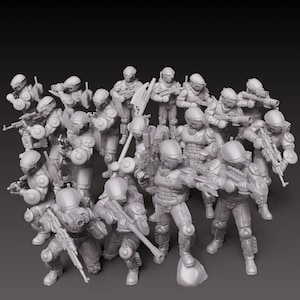 May include: A group of gray plastic miniature figures of soldiers, each holding a weapon, standing in a battle formation.
