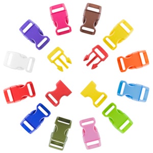 May include: Assortment of 14 plastic side release buckles in various colours, including red, orange, yellow, green, blue, purple, pink, brown, white, and black. The buckles are arranged in a circle on a white background.