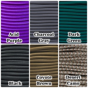 May include: Six spools of different colored elastic cord. The colors are acid purple, charcoal gray, dark green, black, coyote brown, and desert camo.