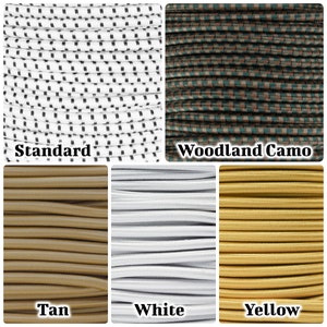 May include: Five spools of elastic cord in different colors and patterns. The colors are white, tan, yellow, and woodland camo. The patterns are standard, woodland camo, tan, white, and yellow.