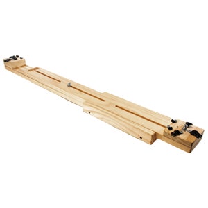 May include: Wooden jig with two parallel tracks and adjustable clamps at each end. The jig is designed for woodworking projects.