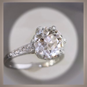 Circa 1920 Style Platinum Engagement Ring set with a 2.04 Ct European Cut Round Diamond VS2