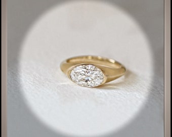 1.50 Ct Oval Cut Diamond East West Bezel Set Solitaire  Engagement / Signet Ring   *IGI Certified  *** By Chelsea Leigh and Company