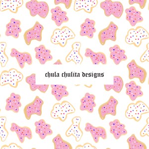 May include: A seamless pattern featuring pink and white cookies with colorful sprinkles. The cookies are in the shape of a horse and a cloud. The text "chula chulita designs" is in the center of the image.