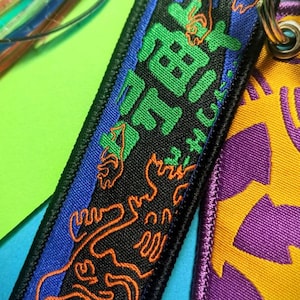 Porte-clés tissé Grizzco Splatoon Fluo Salmon Run