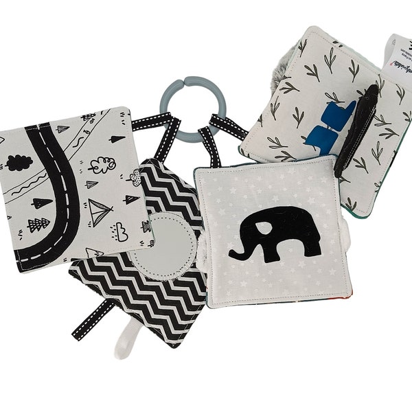 Livre tissu bébé montessori personnalisable à suspendre en coton oeko-tex