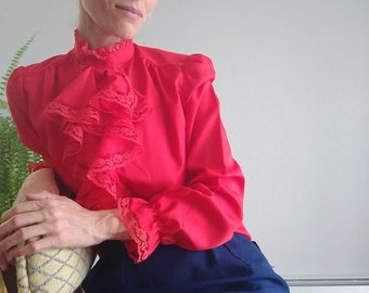 red ruffle front blouse