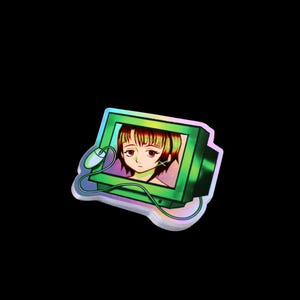 Puede incluir: Pegatina holográfica con un monitor de ordenador verde con una imagen de dibujos animados de una niña. El monitor tiene un ratón conectado. La pegatina tiene un brillo de arcoíris y está sobre un fondo negro.