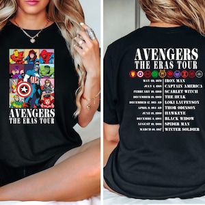 May include: Black t-shirt with a graphic of the Avengers characters and the text "Avengers The Eras Tour". The back of the shirt lists the Avengers characters and their first appearances in the Marvel Cinematic Universe.
