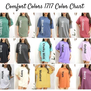 May include: A Comfort Colors 1717 color chart featuring fifteen short-sleeve t-shirts in various colors including light green, moss, blue jean, gray, crimson, black, pepper, chalky mint, violet, orchid, white, ivory, mustard, yam, and berry.