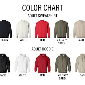 May include: A color chart for adult sweatshirts and hoodies displaying five color options: black, white, red, military green, and sand. The text reads COLOR CHART, ADULT SWEATSHIRT, and ADULT HOODIE, with each color labeled below the corresponding garment.