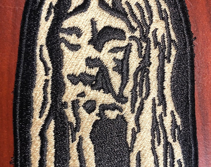 Shrunken Head morale patch 3”H x 2”W