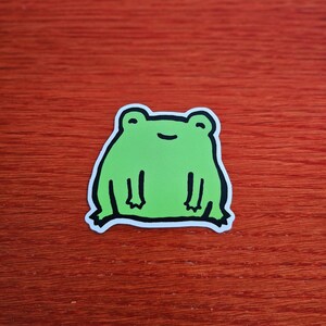 Gelukkige kleine kikkersticker