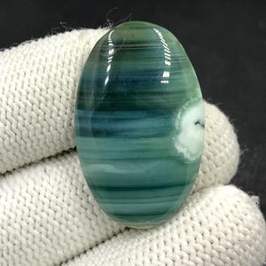 Cabochon Saturne calcédoine... Cabochon ovale...34x21x6 mm...30 Cts...A#N8777