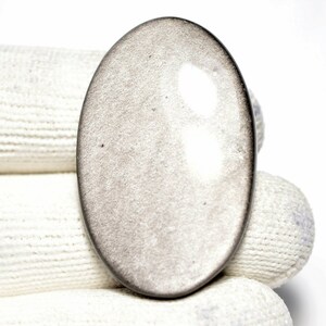 Cabujón de obsidiana plateada... Cabujón ovalado... 39x25x5mm.. 39Cts... #i3038