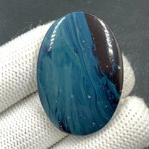 Leland Blue Cabochon...Oval Cabochon...40x28x5 mm...52 Cts...A#N1063