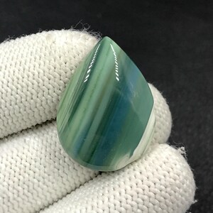 Cabujón de Calcedonia de Saturno... Cabujón Pera... 29x21x6 mm... 28 Cts... A#N8786