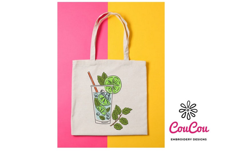 May include: A white tote bag with a drawing of a glass of mojito with lime wedges, mint leaves, and a straw. The bag has a pink and yellow background.