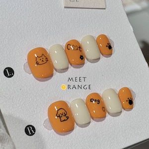 Kawaii Press On Nails: Orange Hand-Painted Cat & Dog Design