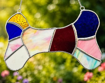 Vibrant stained-glass dog bone suncatcher