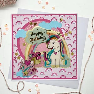 SCINTILLA,card biglietto di auguri per compleanno bimba fatto a mano nei toni del rosa con unicorno,stelline,arcobaleno,fiocchi