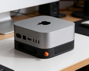 Base para Mac Mini M4 impresa en 3D con palanca de interruptor, disipación de calor y antideslizante.