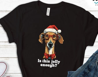 May include: Black t-shirt with a graphic of a dog wearing a Santa hat and bow tie. The text "Is this jolly enough?" is printed below the dog.