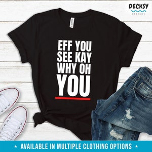 以下が含まれることがあります： 黒いTシャツに白い文字で「EFF YOU SEE KAY WHY OH YOU」と書いてあり、文字の下に赤い線が引かれている。