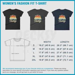 May include: Three t-shirts in different colors, black, gray, and blue, with a vintage-style graphic that says "I'm not old, I'm vintage". A size chart shows the width and length measurements in inches and centimeters for sizes S, M, L, XL, and 2XL.