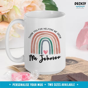 May include: White ceramic mug with a rainbow design and the text "Thank you for helping me grow" and "Ms Johnson".