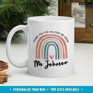 May include: White ceramic mug with a rainbow design and the text "Thank you for helping me grow Ms Johnson".